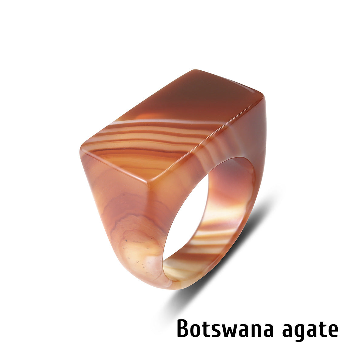 Banded agate stone ring with a rectangular face on a white background