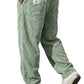 Elastic drawstring waistband detail of the wide wale corduroy trousers