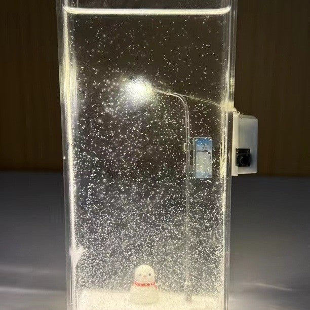 DIY Christmas LED night light shown beside its printed gift bag on a table