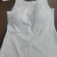 White seamless nylon square neck tank top, flat lay on a dark table, size XL option photo
