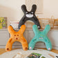 Range of animal X shaped plush car pillows in husky pig dinosaur and rabbit designs
