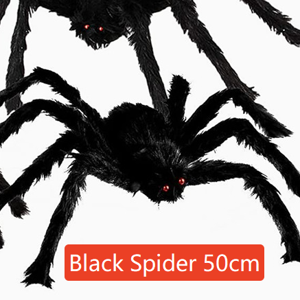 Hairy black Halloween spider prop with red eyes, flocked body and eight posable bendable legs