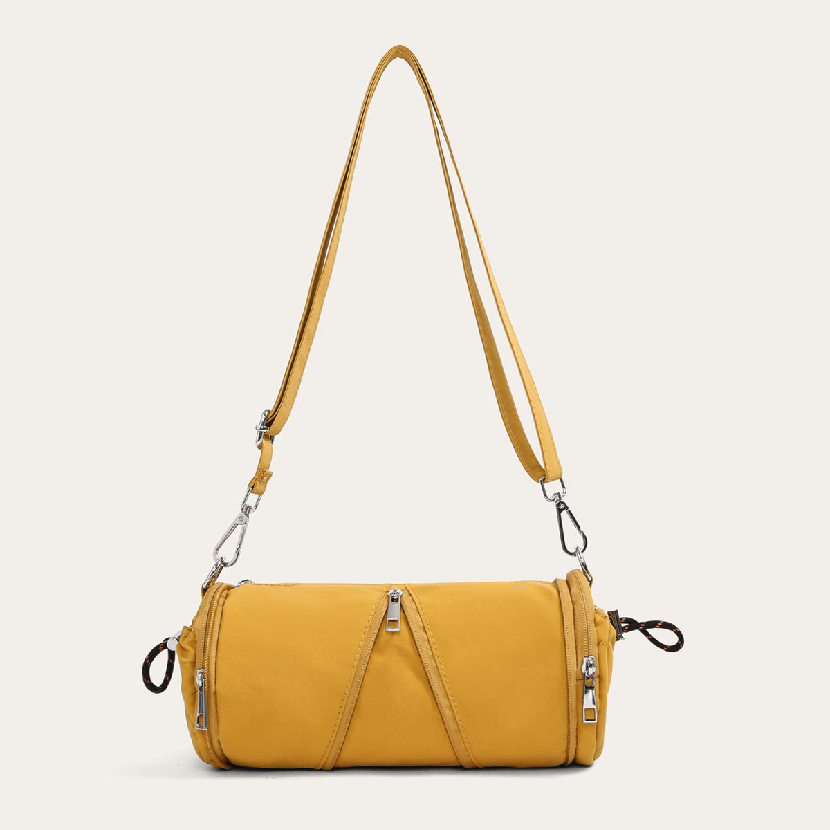Yellow cylindrical nylon crossbody bag with stitched front lines and silver hooks, variant image for the yellow color