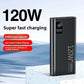 Black power bank marked 120W upright with the charge percentage on screen