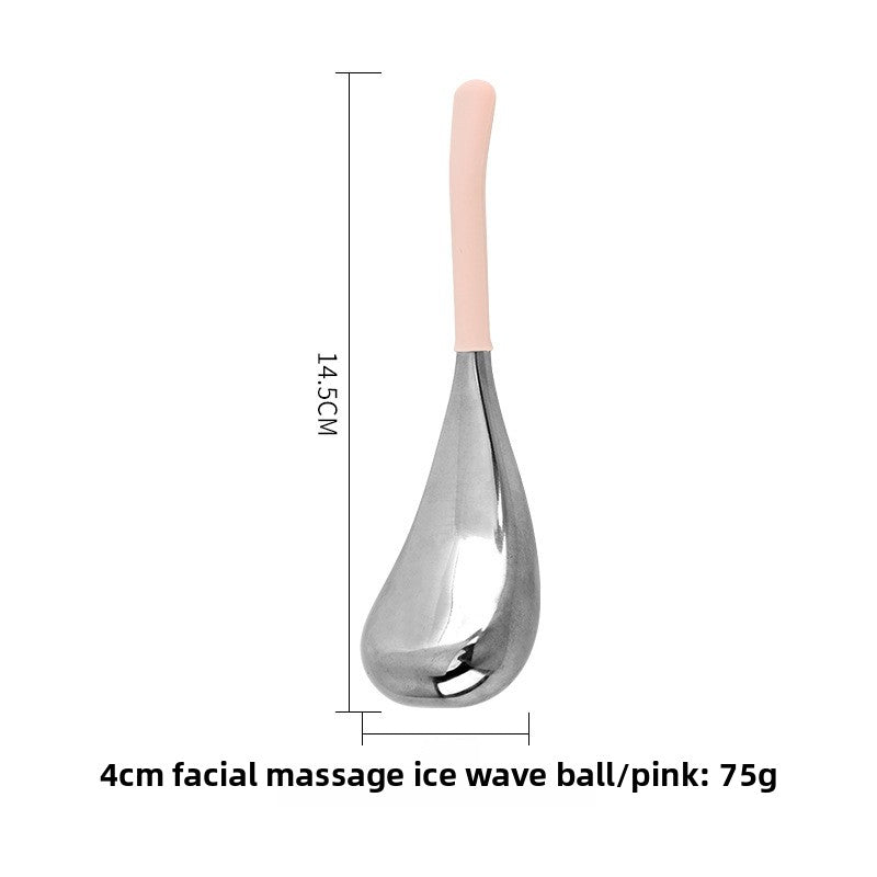 Stainless steel facial massage globe with pink handle shown with size marks in centimeters