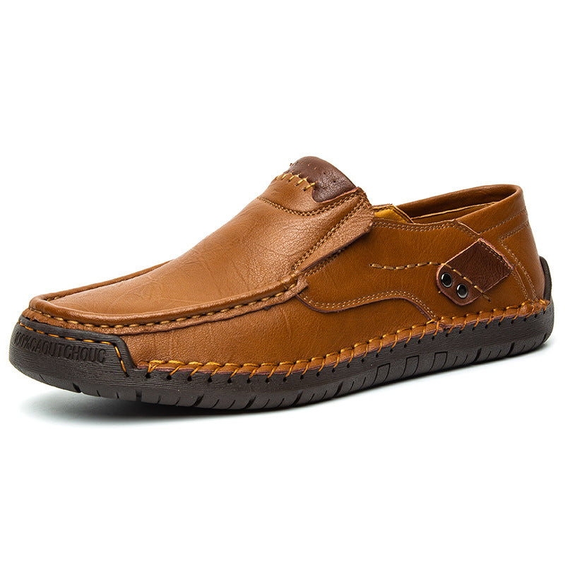 Rubber sole and low heel of a mens cowhide leather slip on loafer