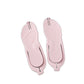 Pink folding flip flops seen from the sole showing foot-shaped tread and toe imprints
