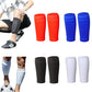 Red, blue, black and white shin guard sleeves beside a player pulling a sleeve over a shin guard