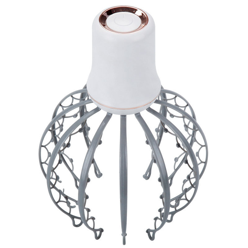 Close up of the intensity control button on the scalp massager