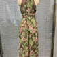 Side profile of the green slimming dress showing how the skirt falls over the hips