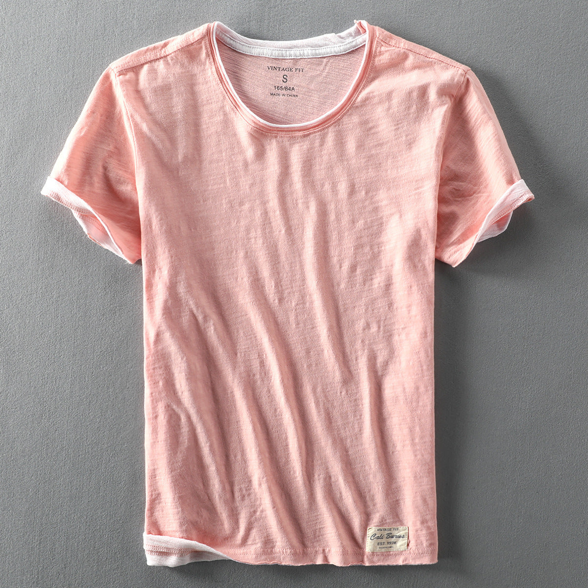 Pink washed slub cotton short sleeve tee, wide round neck front flat lay, size L