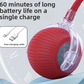 Red motorized rolling ball for dogs and cats with braided rope tail and glowing inner light