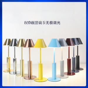 Rechargeable touch control metal table lamp with coolie shade glowing warm white