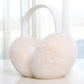 White Fabric Band foldable plush winter earmuffs, front three quarter view