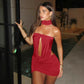 Red backless dress laid flat top down showing the full sleeveless shape