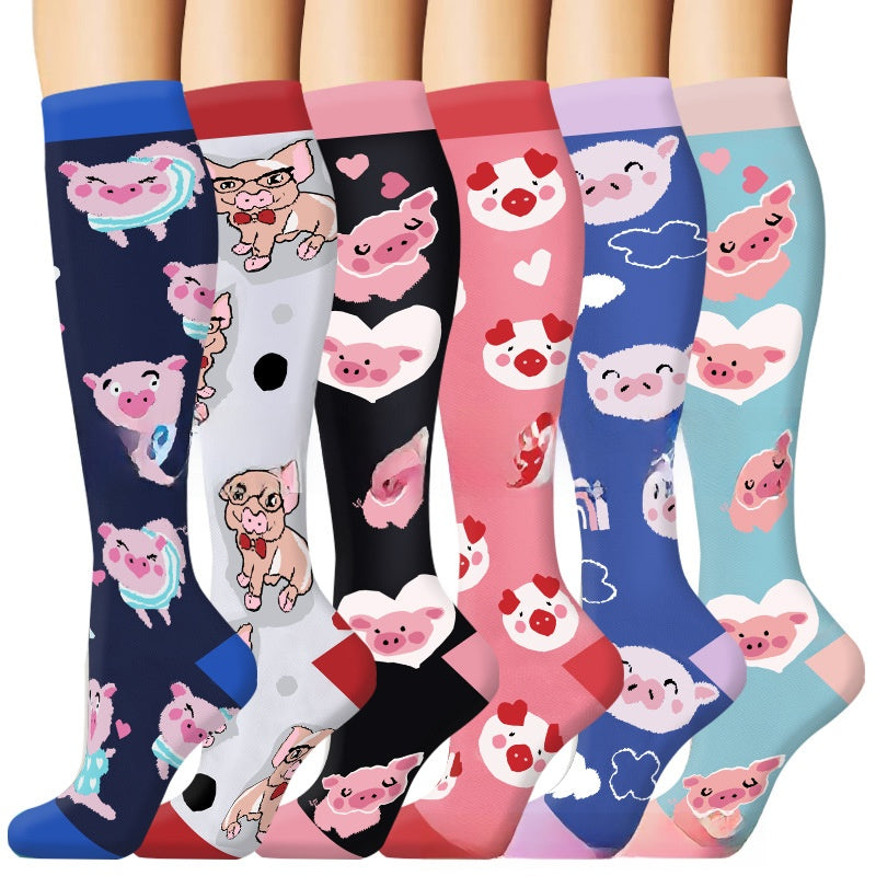 Assorted print knee high compression sport socks laid out side by side