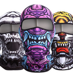 Three printed balaclavas side by side: skull, purple monster and tiger designs with open eye slots
