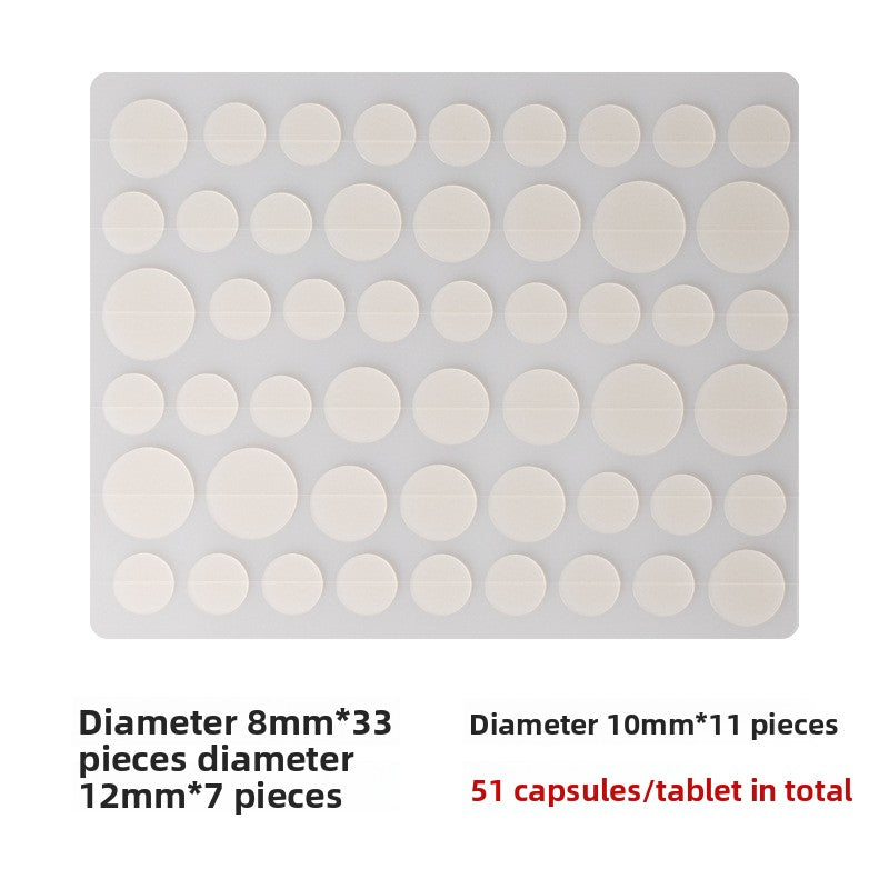 Sheet of fifty one hydrocolloid discs mostly eight millimetres with larger ten and twelve