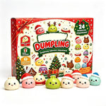 Red and cream Mystery Dumpling Christmas advent calendar box with eight smiling squeeze toys in festive hats in front