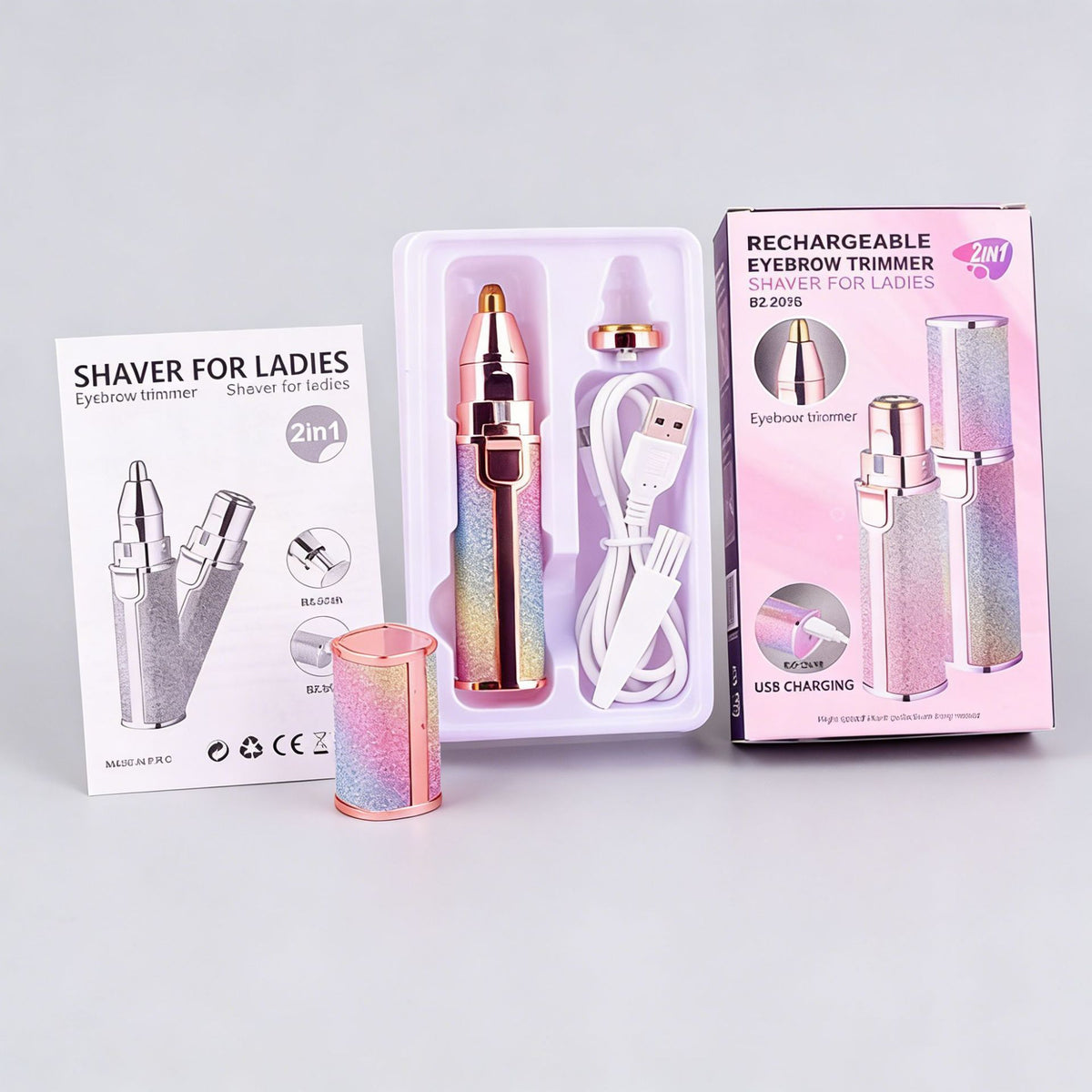 Ladies facial shaver and eyebrow trimmer beside their pink retail boxes