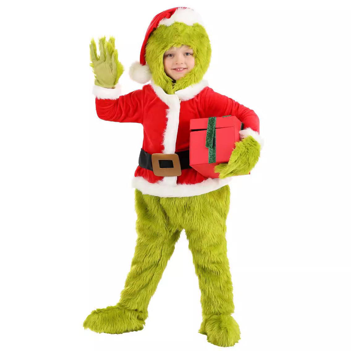 Child waving in the green fur pants, red Santa coat and hooded hat while holding a red gift box