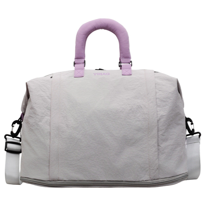 Expandable Oxford travel duffel bag shown from the side, water resistant shell