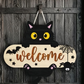 Decorative wooden Halloween door hanger, flat printed board with a cord to hang on a door or wall