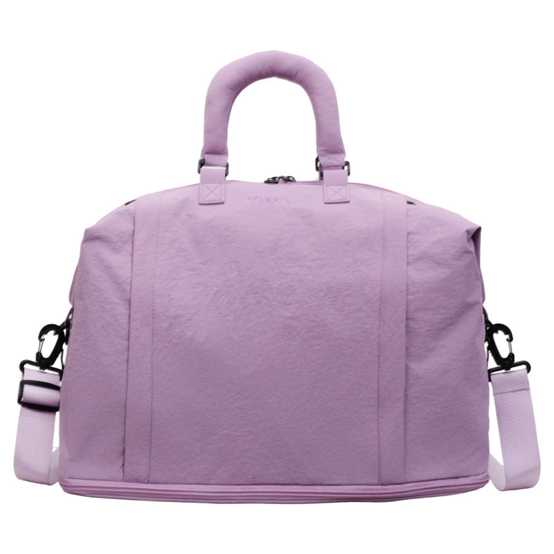 Compact Oxford travel duffel bag shown in a solid colour on a plain background