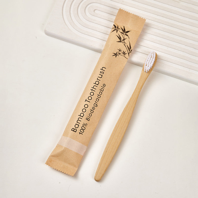 Twelve bamboo toothbrushes lined up with bristles in different colors
