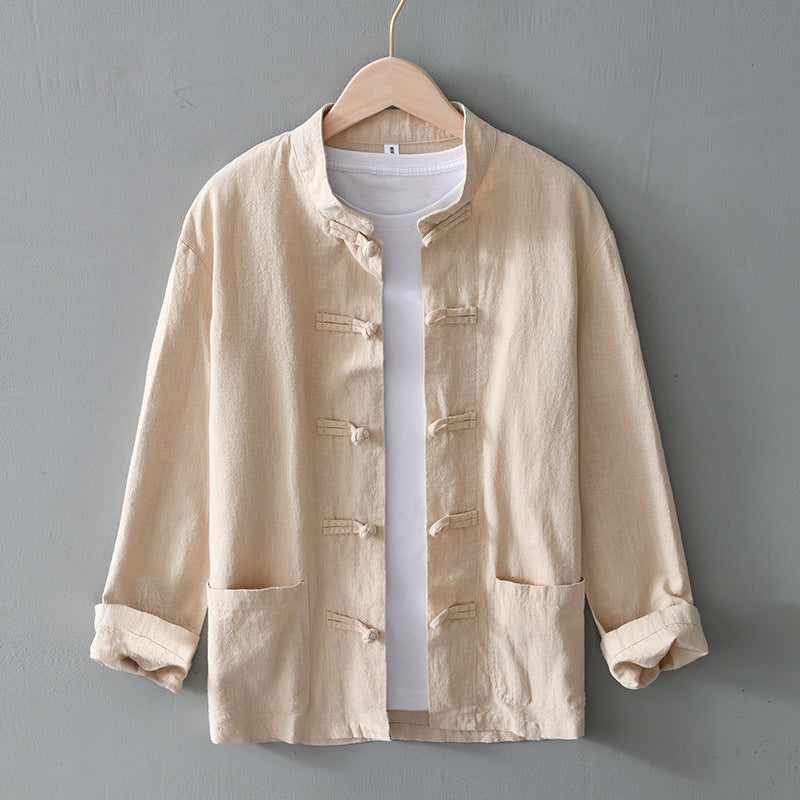 Khaki frog closure shirt jacket with stand collar on a hanger over a white tee, image of the size M option