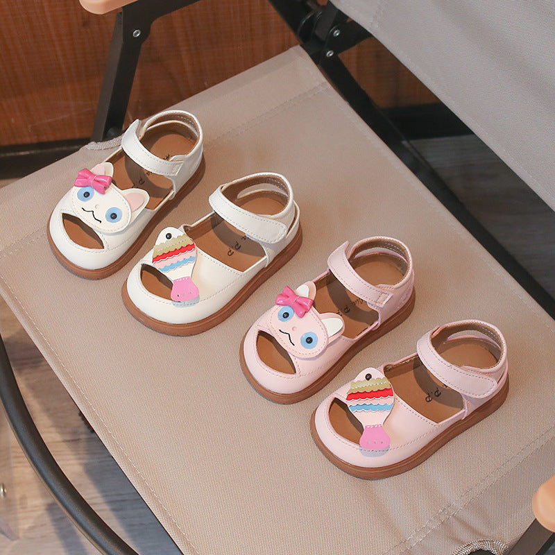 Cartoon Baby Sandals Soft Sole | scale reference with hand