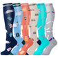 Knee-high compression socks displayed on legs across several pattern options
