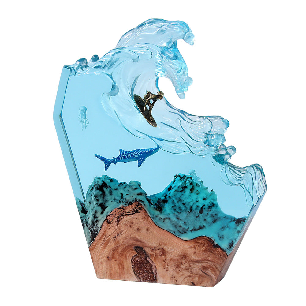 Resin ocean lamp lit by internal LED with surfer on cresting wave detail