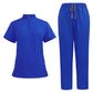 Womens scrub top in light purple shown flat to display the stand collar, quarter zip and hip pockets
