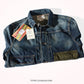 Folded retro denim jacket showing vintage paper hang tags and notch lapel collar