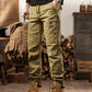 Close up of washed cargo pant fabric showing faded retro tone and weave
