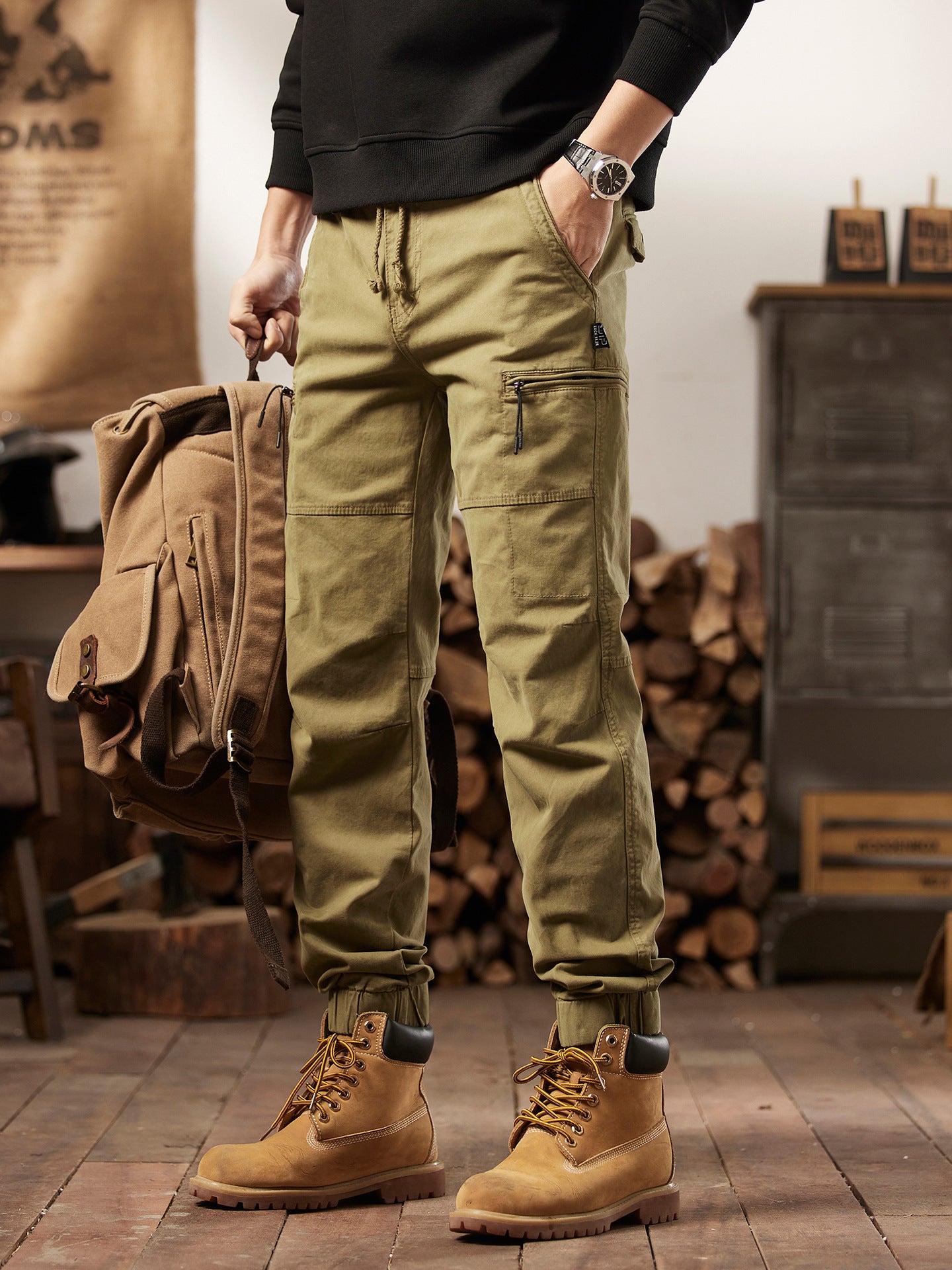 Close up of washed cargo pant fabric showing faded retro tone and weave