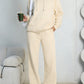 Cream fleece hooded sweatshirt and wide-leg sweatpants set worn by a model