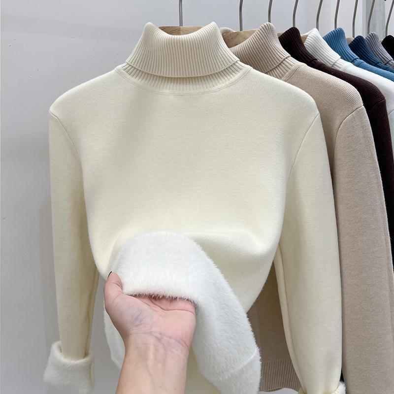 Cream high collar fleece lined knit sweater, size L option, shown on a hanger
