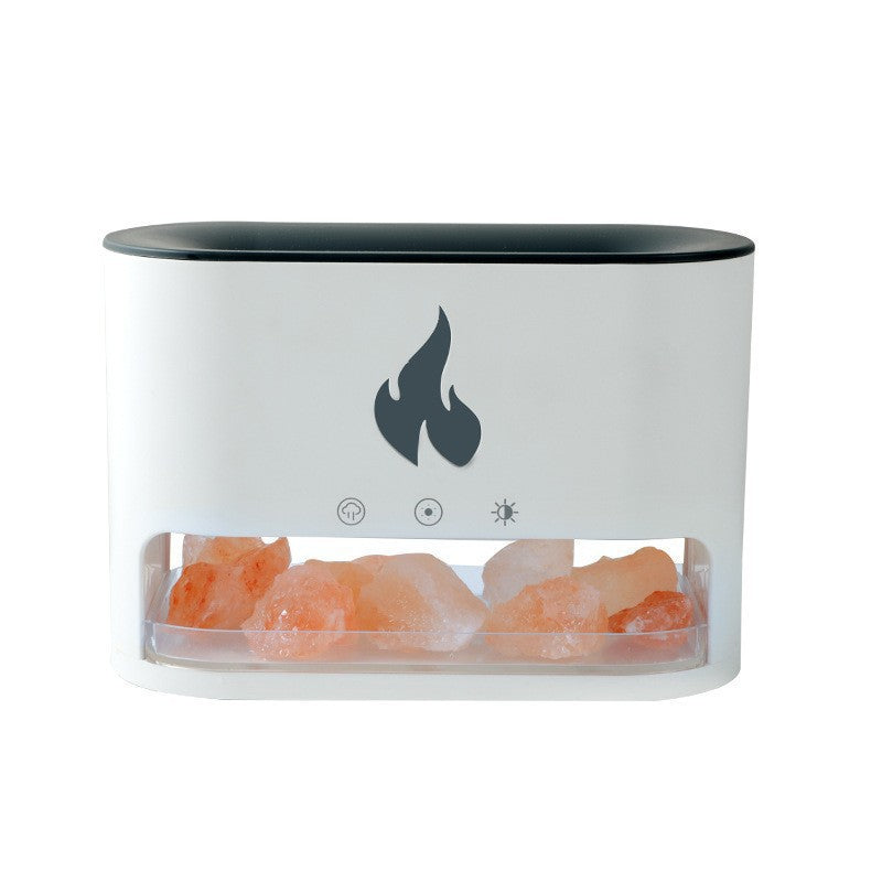 White aroma diffuser with black lid and a front tray of pink salt rocks, no mist