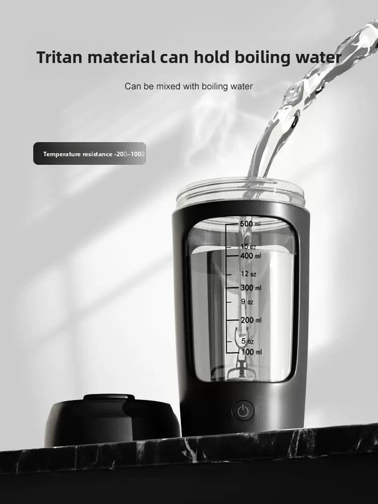 Portable electric shaker cup with a clear Tritan body and a motorized mixing base
