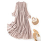 Side angle of the silk dress falling from hip to knee