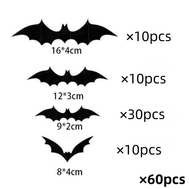 Small and large black bat wall stickers grouped on a plain white background
