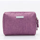 Water resistant Oxford cloth toiletry bag zipped closed showing the cube shape