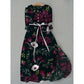 Loose polyester floral midi dress with a rounded doll collar and half button placket