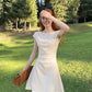 A-line cap sleeve ruched waist mini dress in soft stretch knit, the round neck and cap sleeves detail