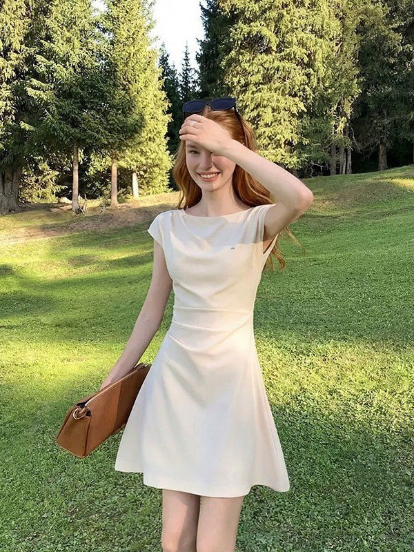 A-line cap sleeve ruched waist mini dress in soft stretch knit, the round neck and cap sleeves detail