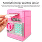 Money box with a note slot that rolls banknotes in with a motor, shown close up