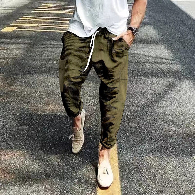 Army green ribbed corduroy pants with drawstring waist and thigh pockets, photo used for the Army Green M option