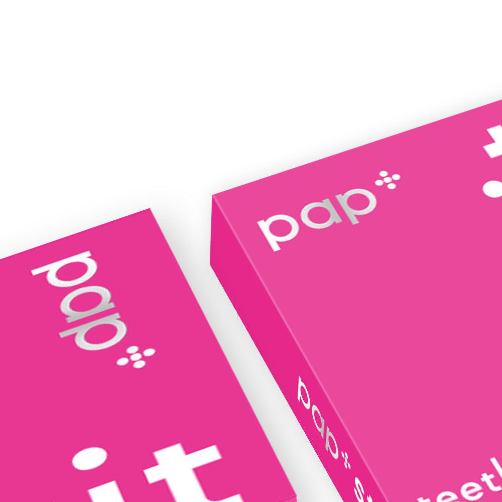 Close-up of two pink PAP+ teeth whitening strips cartons showing the pap+ logo